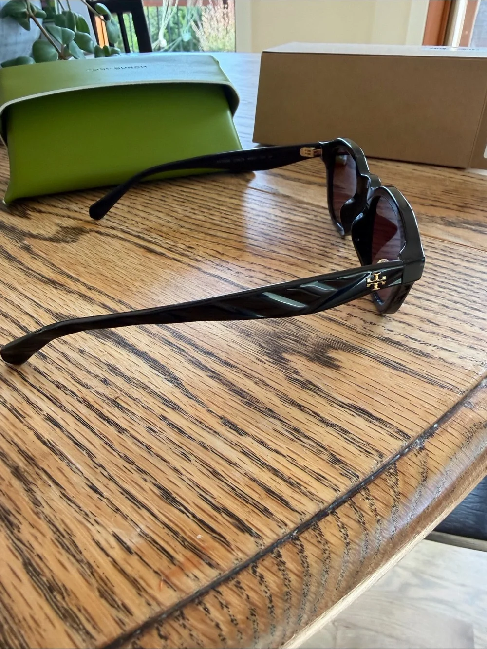 Tory Burch Black Frame Sunglasses with Violet Polarized Lenses